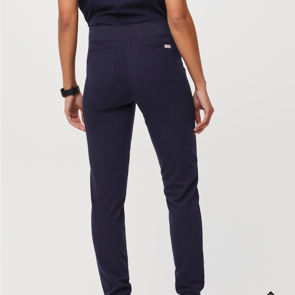Zamora jogger with small Aya healthcare symbol on back calf.barely worn
